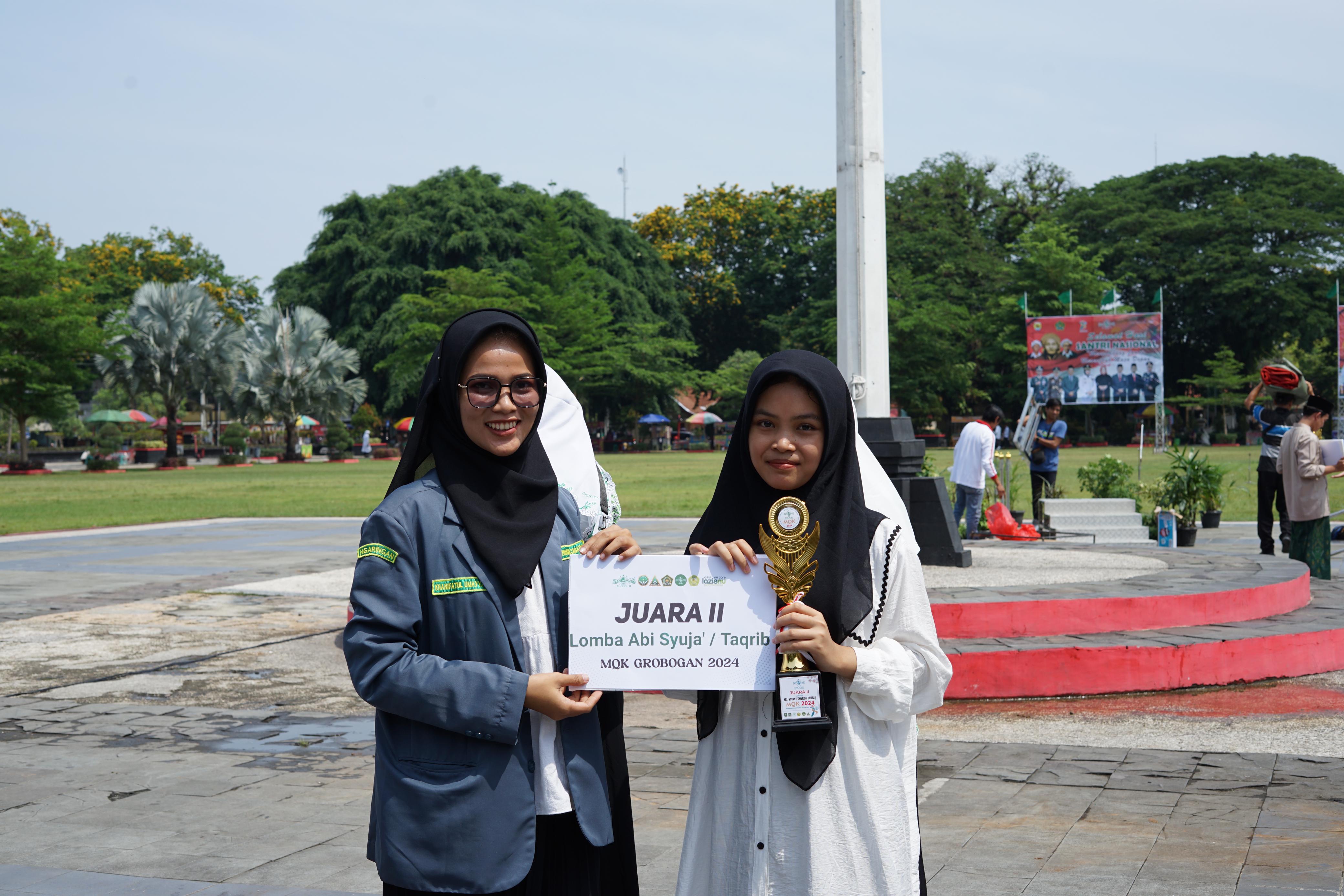 Foto Naily Wifakur Rohmah Juara 2 MQK Abu Syuja'